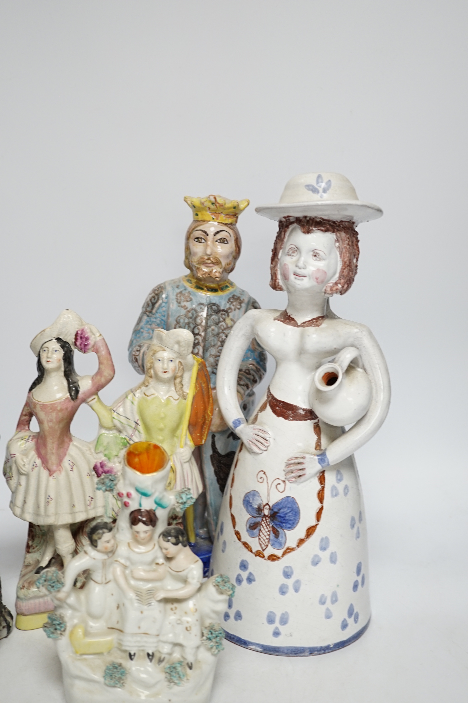 A Maiolica figure of a king and 4 other items including Staffordshire